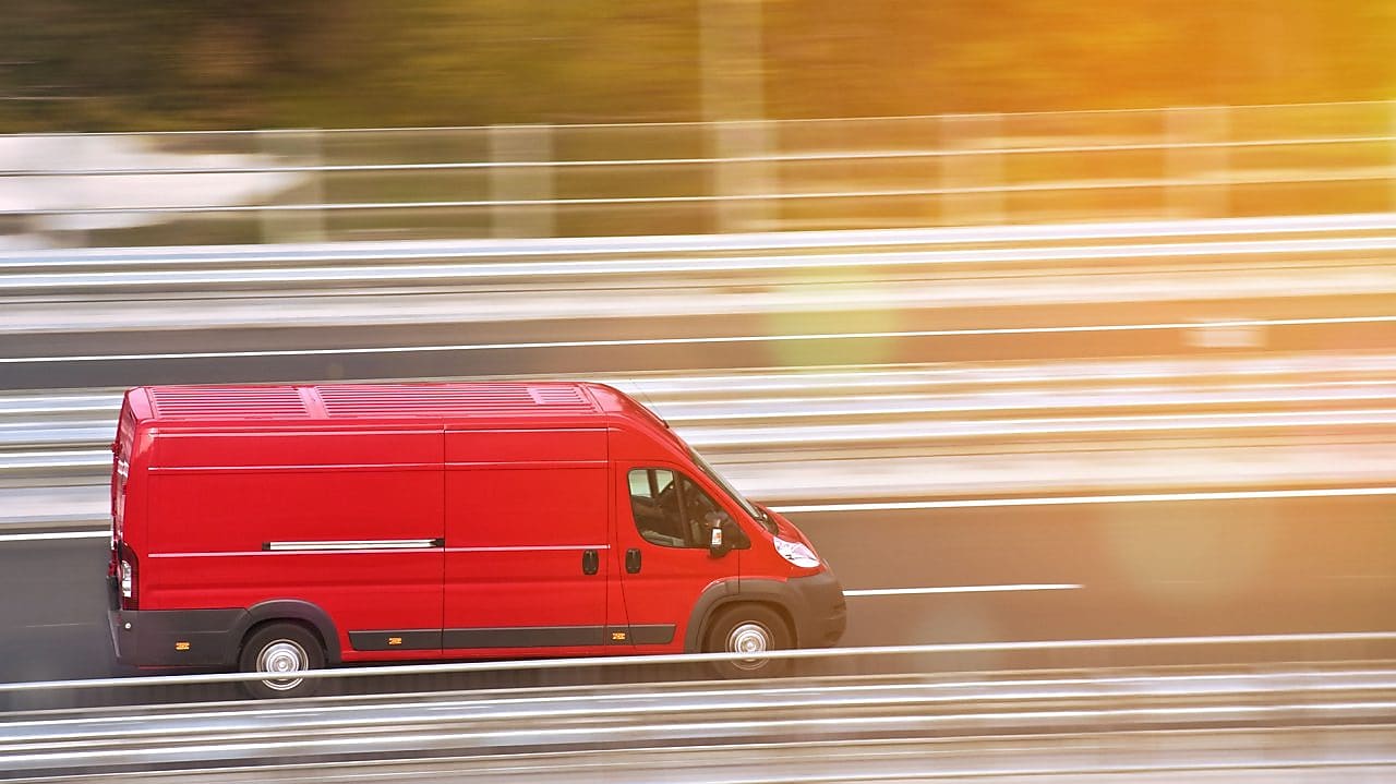 red van -on highway
