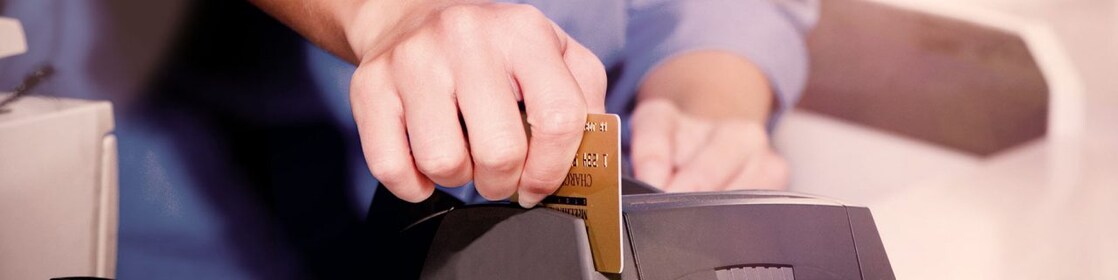 person swiping creditcard