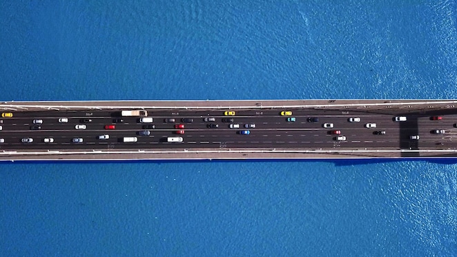 cars on a bridge header image