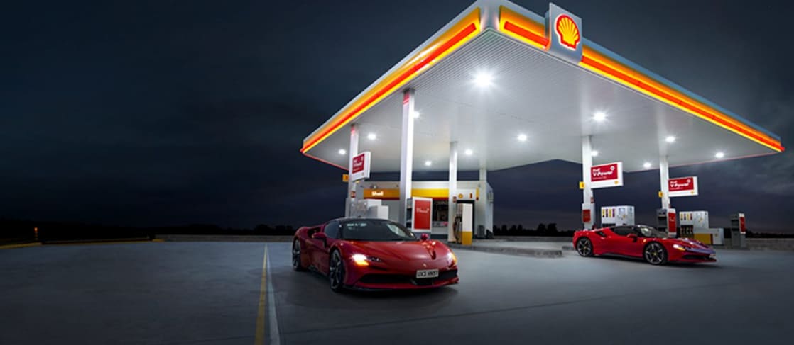 cars parked infront of shell station