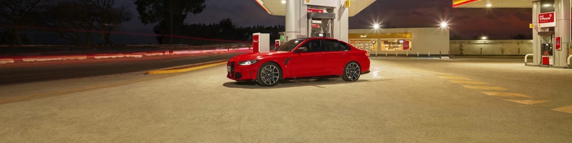 Shell infinity car infront of Shell station