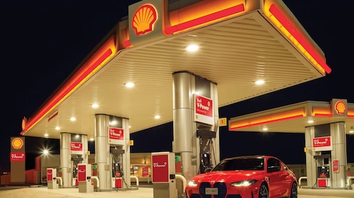 bmw car in front of shell station
