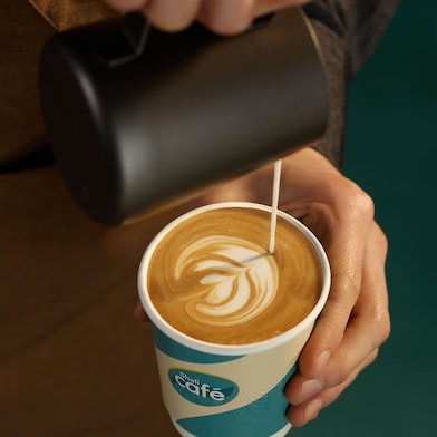 Person pouring coffee